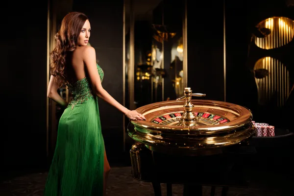 A person using their device against a moody casino-themed background, illustrating the smooth re-entry process at 7555BET.
